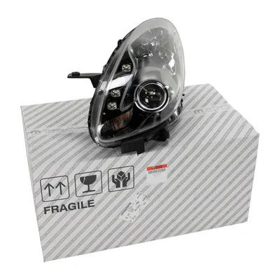 Headlight original front left H7 / H1